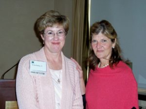 Two Women Standing Side by Side