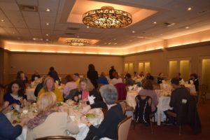 A Group of People Sitting for Lunch