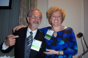 A Man and a Woman With ID in a Conference