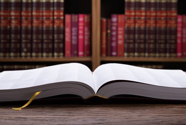 An Opened Book Lying on a Table