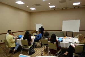 A Group of People Sitting for a Presentation