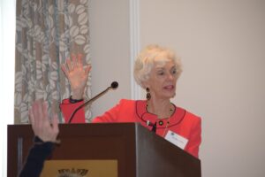 A Woman in an Orange Color Jacket