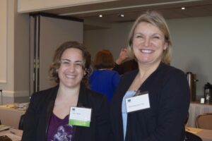 Two Women Smiling With Each Other