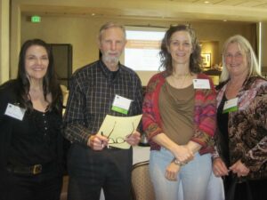 Three Women With ID Cards and a Man