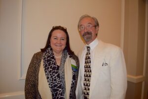 A Man and a Woman Standing Beside Each Other